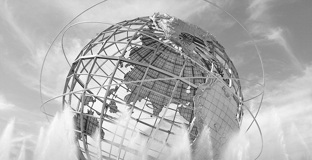 globe structure surrounded by water fountains
